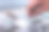 高质量的摄影。特写的手容纳一个镜头在公文包装满了不同的处方镜头。图片下载