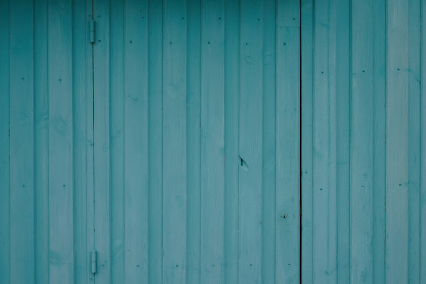 绿色的木头背景近距离墙壁制成的蓝色垂直木板图片下载