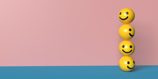 粉色背景上的笑脸表情的垂直堆叠图片下载