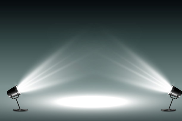 聚光灯照亮了舞台。背景上的照明设备。图片下载