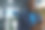 快乐的商人穿着西装在办公室使用智能手机图片下载