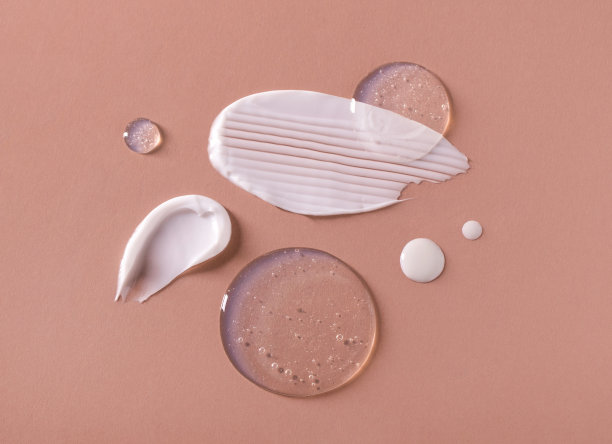 化妆品涂抹奶油质地的粉彩背景图片下载