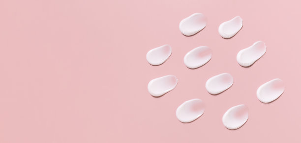 化妆品涂抹奶油质地的粉彩背景图片下载