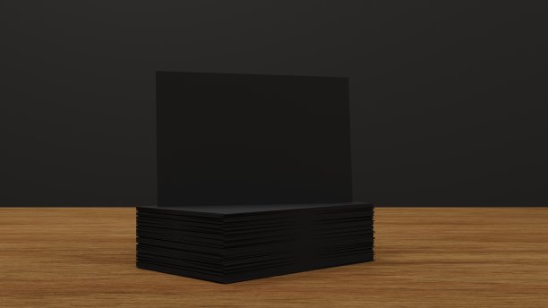 一叠黑色名片，木桌名片模型，宣传公司品牌，3D效果图。图片下载