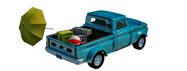 满载行李箱的汽车在棕榈林中穿行图片下载