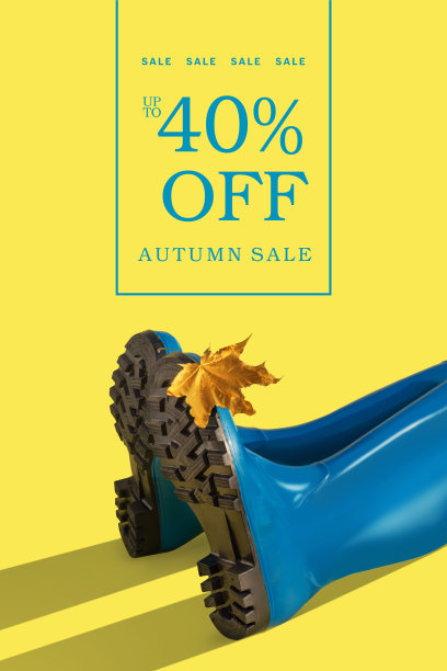 蓝色橡胶靴与秋天金色的枫叶在黄色的背景排版图片下载
