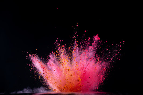 彩色粉末爆炸在粉红色背景捕获高速侧视图图片下载
