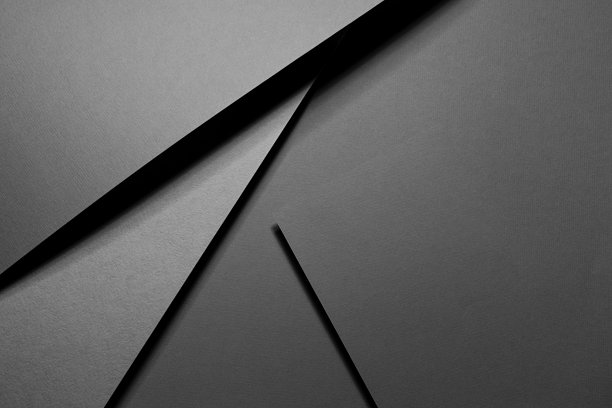 石墨灰色抽象几何背景与飙升的矩形空间，条纹，线，角在硬光，黑影-简单严格的现代风格的名片，海报，传单，顶视图。图片下载