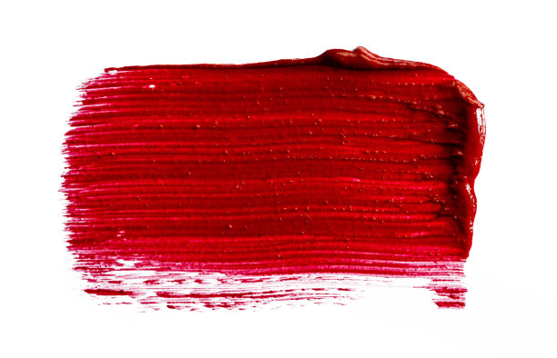 染色块的红色哑光口红在白色的背景图片下载