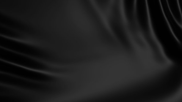光滑的黑色布料般的背景图像。图片下载