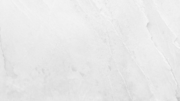表面白色石材质地粗糙，色调灰白色。用它来制作墙纸或背景图像。有一个空白的文字图片下载
