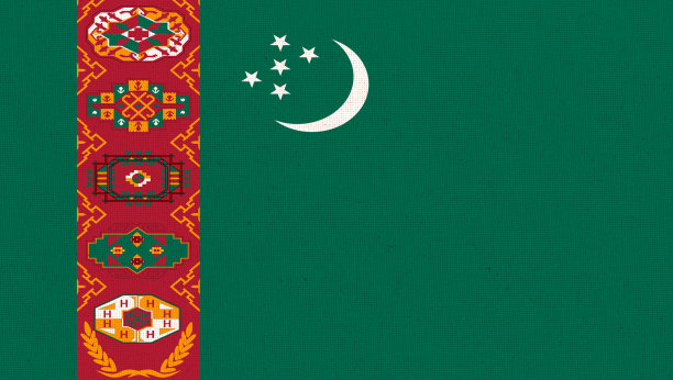 土库曼斯坦的旗帜。织物表面有土库曼国旗。织物纹理图片下载