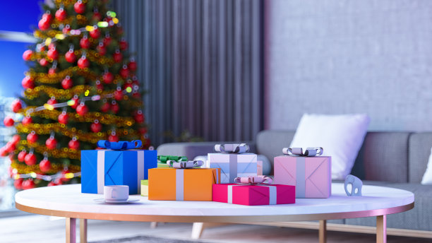 有圣诞树和装饰的桌子上的圣诞礼物图片下载