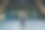 前视图的女商人走下楼梯，拿着笔记本电脑和喝外卖咖啡。商业成功的概念。商业、生活方式的概念。人们生活方式的概念。城市背景。完整的长度。图片下载