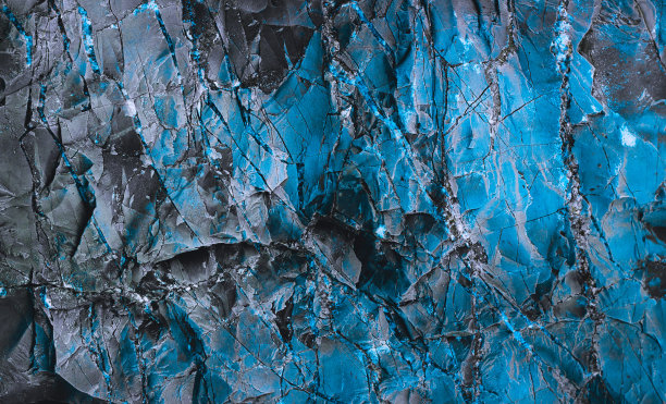 冰纹理。粗糙结构矿物。石头的背景。冰表面纹理。在冰分裂。酷的背景。冰裂纹。岩石纹理。抽象的纹理。熔岩冻结。岩石堆。图片下载