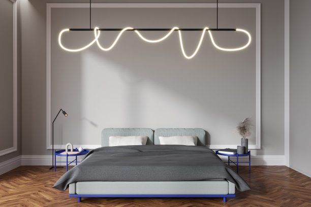 现代卧室内饰有床和床头柜上的装饰。模型墙图片下载