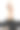 金发长发的女孩穿着白衬衫和黑色的布裤子在时尚拍摄。图片下载