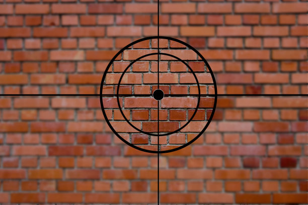 一堵石墙前的准星图片下载