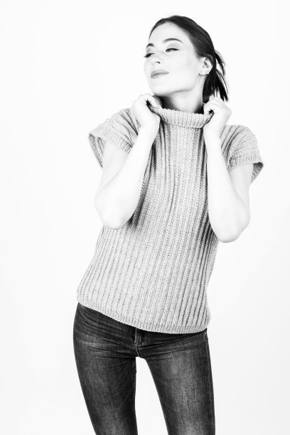 女人穿无袖毛衣的特写镜头图片下载