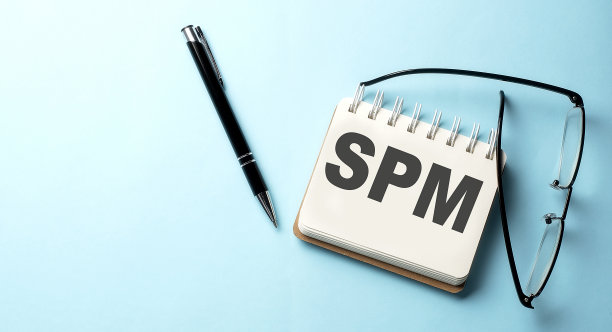 销售绩效管理文本写在记事本上的蓝色背景图片下载