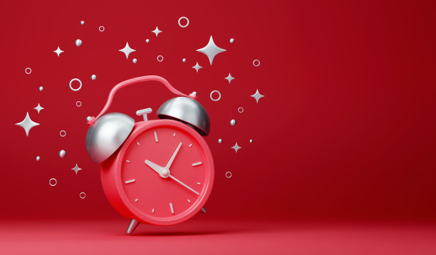红色复古响闹钟与白色星星在红色背景。复古的设计图片下载