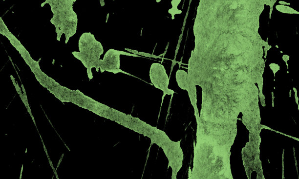 黄绿墨水飞溅。难看的东西洒出来了。抽象的背景。图片下载