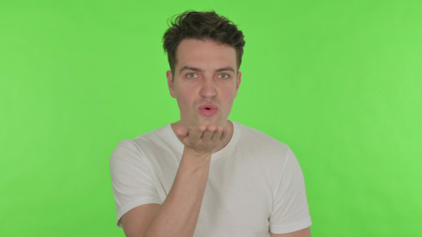 青色背景上的飞吻图片下载