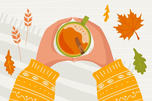 两只手拿着暖暖的针织袖子，拿着放着肉桂的热饮杯，放在铺满秋叶的木桌上。秋天的心情。矢量插图在秋叶颜色的平面风格图片下载