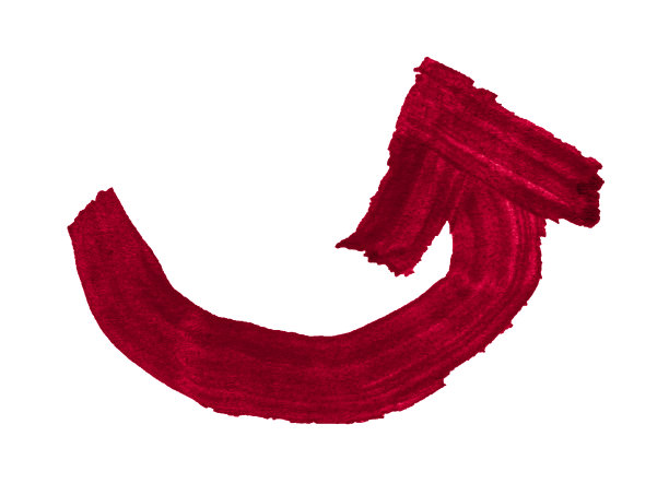 用毛笔在纸上画的向右向上的红色半圆箭头。图片下载