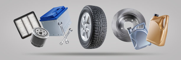 用于汽车修理和服务的工具和物品，如车轮;电池;容器中的油;灰色背景上的钥匙。图片下载