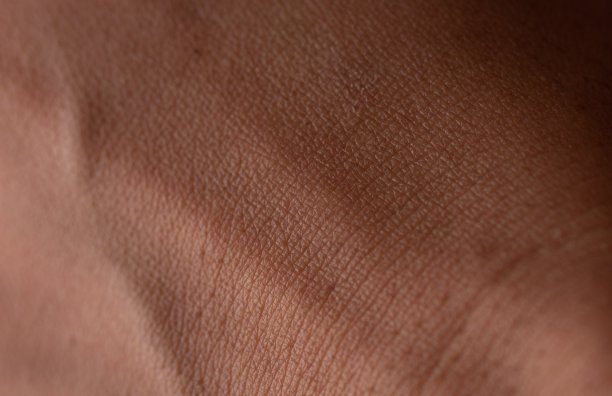 人体皮肤质地背景，棕色皮肤图片下载