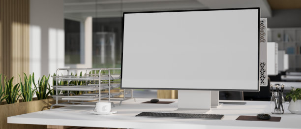 现代办公桌与空白PC桌面电脑模型和装饰在白色的桌子上。图片下载