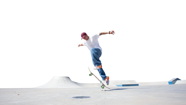 滑板者在白色背景上做一个孤立的技巧图片下载