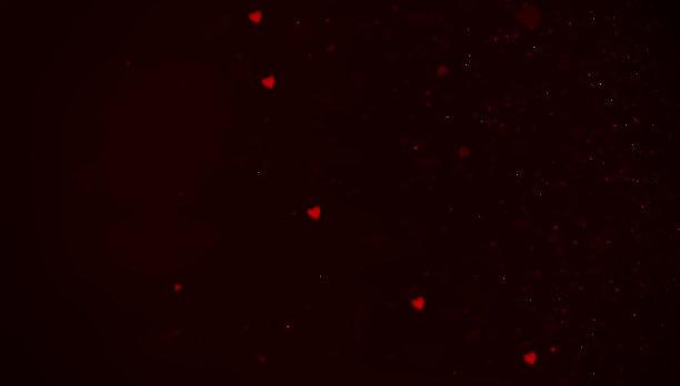 红色离焦闪光在心脏图案背景。图片下载