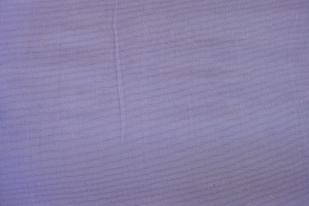 淡紫色光滑的织物布质地为背景和设计艺术作品。图片下载