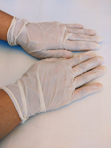 戴手套，手套乳胶一次性外科防护安全医用弹性无菌检查手套医生手上戴手套戴手套卫生消毒清洁护士医生健康手部护理围裙非粉末图像查看照片图片下载