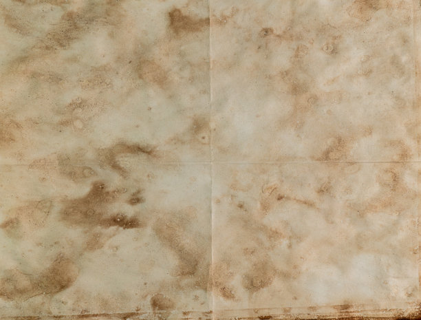 一页旧书或书法。靠近黄色的古代羊皮纸。写作、学习和教育观念。制书用的纸。图片下载