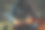 一个戴着兜帽的匿名黑客正在一间黑暗的房间里用笔记本电脑键盘打字。网络战争和Dos攻击的概念图片下载