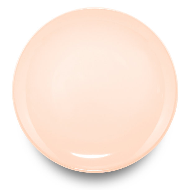 白色背景上的棕色圆形陶瓷板。图片下载