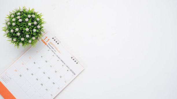 台历与花瓶顶视图白色背景的桌子图片下载