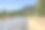 专业的白色大钻机半挂车牵引车和半挂车在拐弯的高速公路上运行，在风景秀丽的自然野生哥伦比亚峡谷地区图片下载