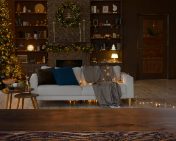 圣诞节的背景。空木桌背景模糊的圣诞客厅与美丽的金色散焦。准备好产品蒙太奇。横幅。复制空间。模型。图片下载