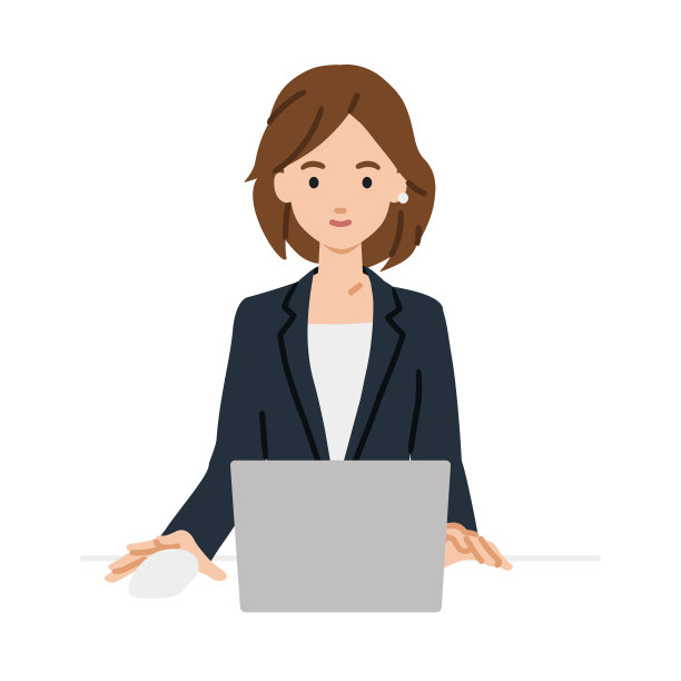 一位身着西装的女士在办公桌前使用笔记本电脑图片下载