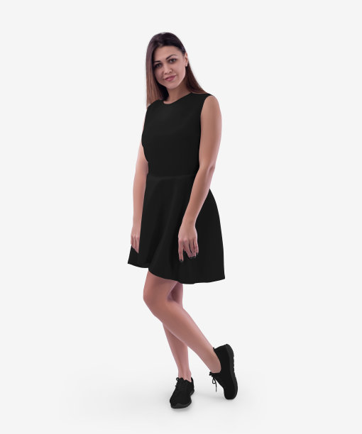 模型的黑色连衣裙与波浪裙在一个美丽的女孩在鹿皮鞋，夏天的太阳裙的设计，模式，广告。图片下载