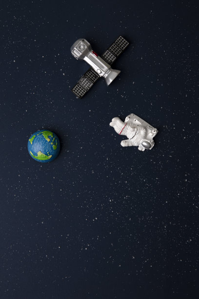 太空背景上的宇航员和地球图片下载