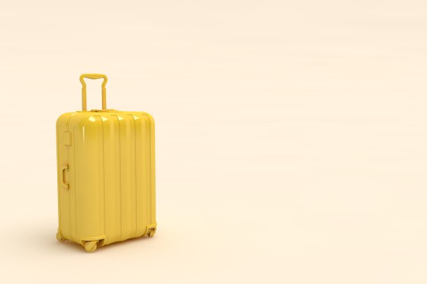 白色背景的黄色旅行箱图片下载