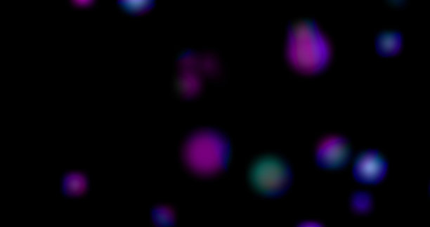 离焦抽象彩色散景灯光背景。蓝色，紫色，绿色，橙色。图片下载