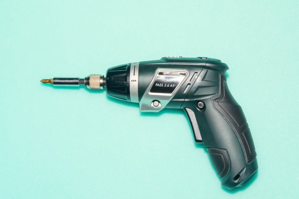 蓝色背景的专业螺丝刀图片下载