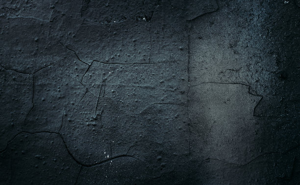 岩石表面有裂缝。黑色的纹理。石头的背景。黑暗的大理石。岩石纹理。岩石堆。墙漆点。枯燥乏味的粗糙结构。抽象的纹理。图片下载