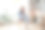 一个穿着西装的年轻女子坐在椅子上看书图片下载